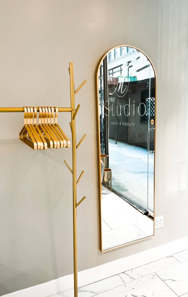 M. STUDIO entrance with branded mirror
